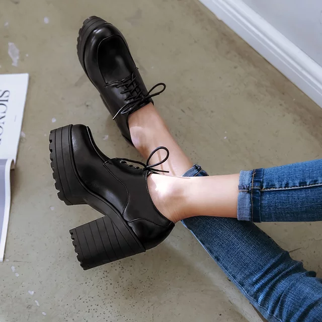 Black retro 70's disco shoes, platform chunky oxford heels.