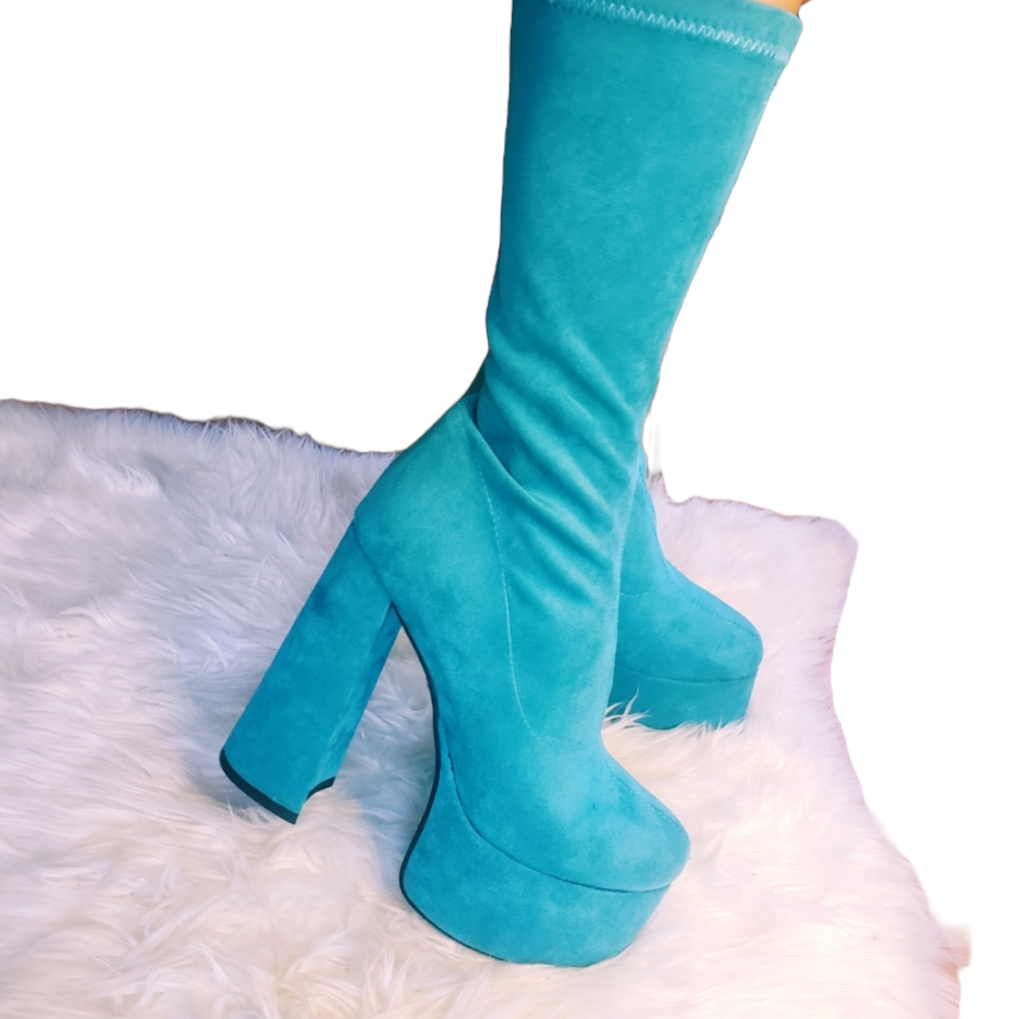 Teal blue suede retro chunky platform boots. Round toe and block heel give it a 60's and 70's inspired twist. Knee high suede boots. 