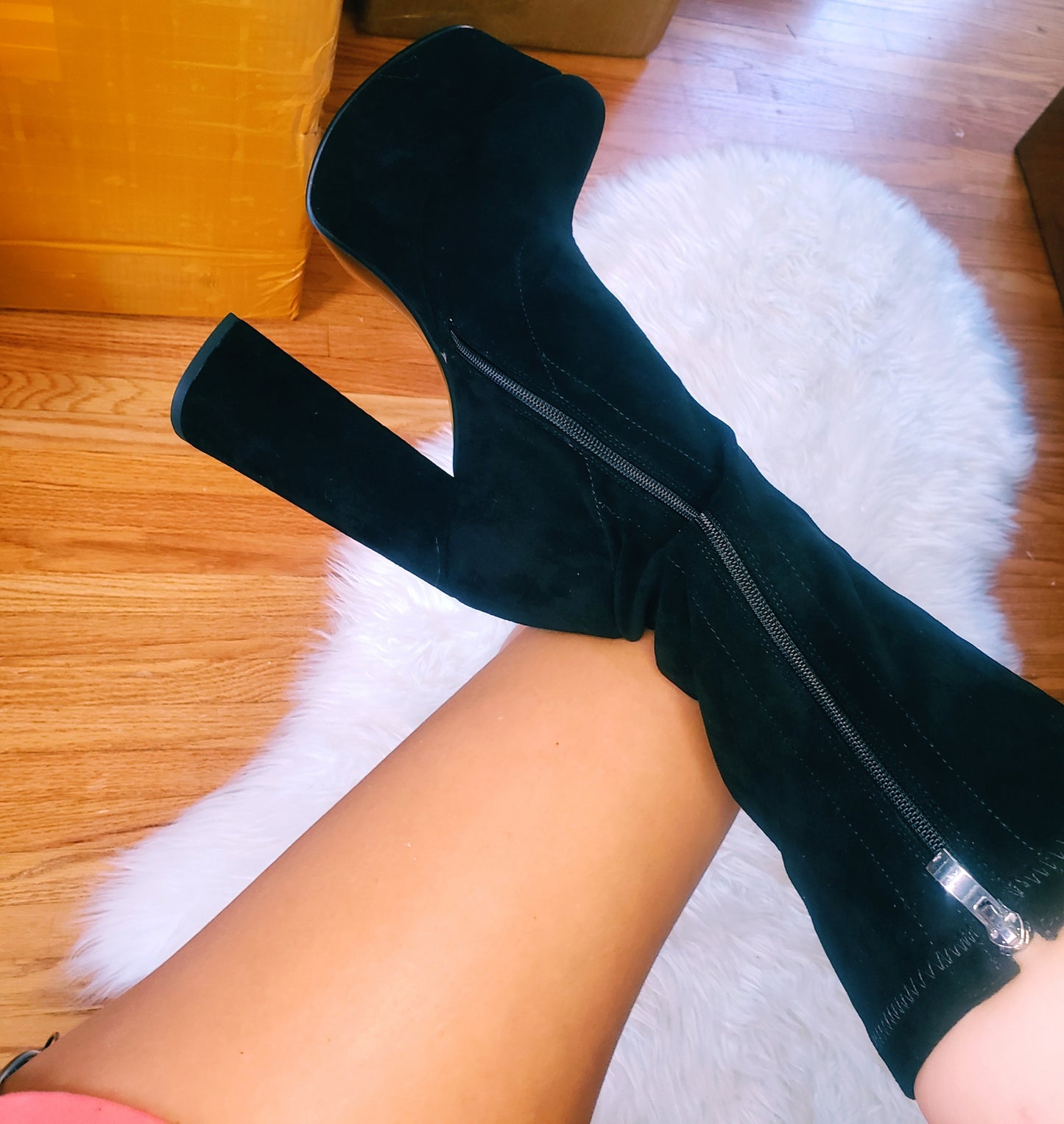 Black suede retro chunky platform boots. Round toe and block heel give it a 60's and 70's inspired twist. Knee high suede boots. 