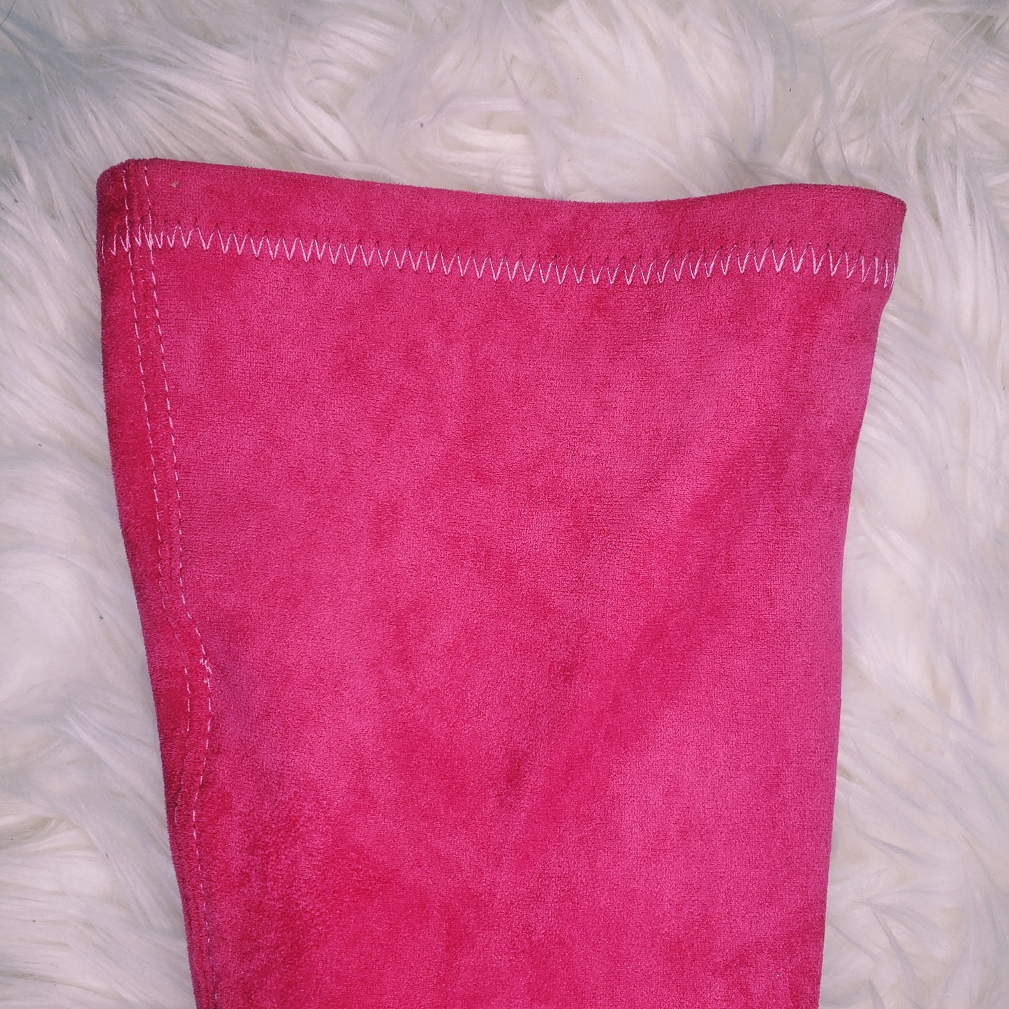 Pink suede retro chunky platform boots. Round toe and block heel give it a 60's and 70's inspired twist. Knee high suede boots.