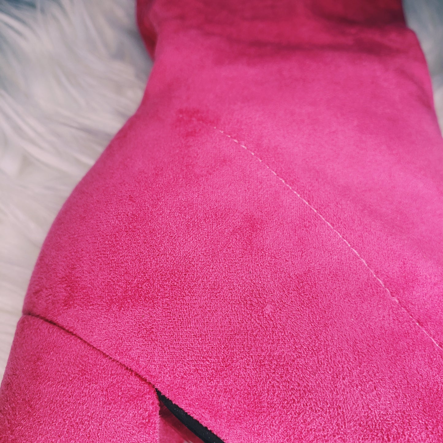 Pink suede retro chunky platform boots. Round toe and block heel give it a 60's and 70's inspired twist. Knee high suede boots.