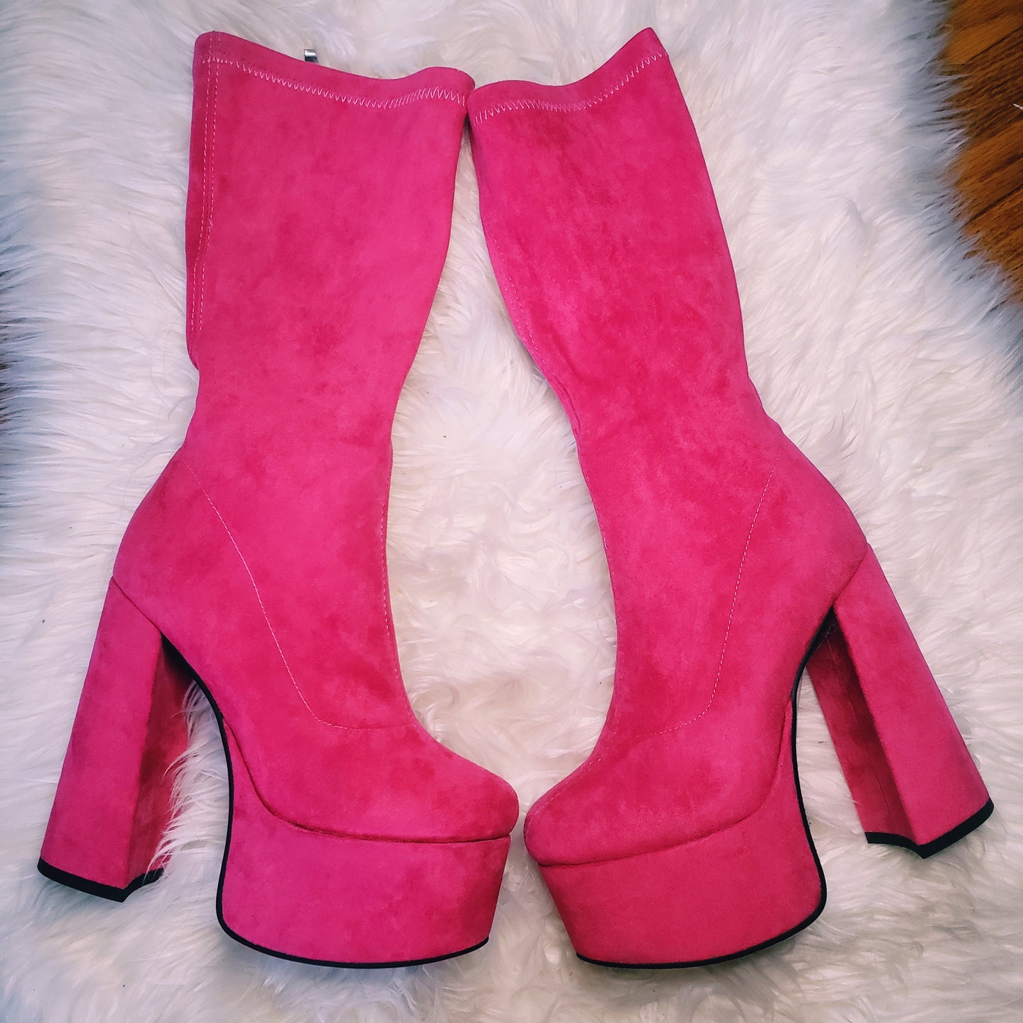 Pink suede retro chunky platform boots. Round toe and block heel give it a 60's and 70's inspired twist. Knee high suede boots. 