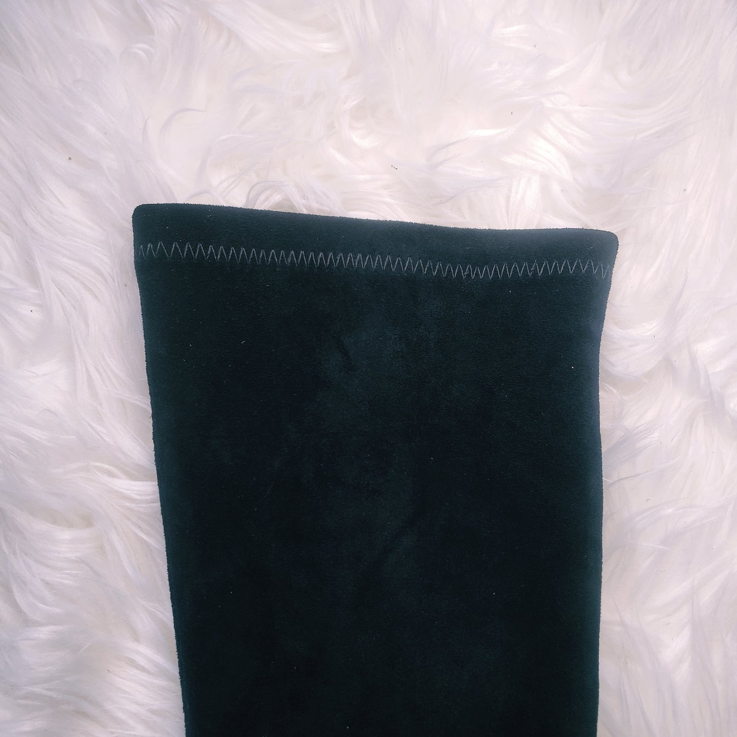 Black suede retro chunky platform boots. Round toe and block heel give it a 60's and 70's inspired twist. Knee high suede boots.