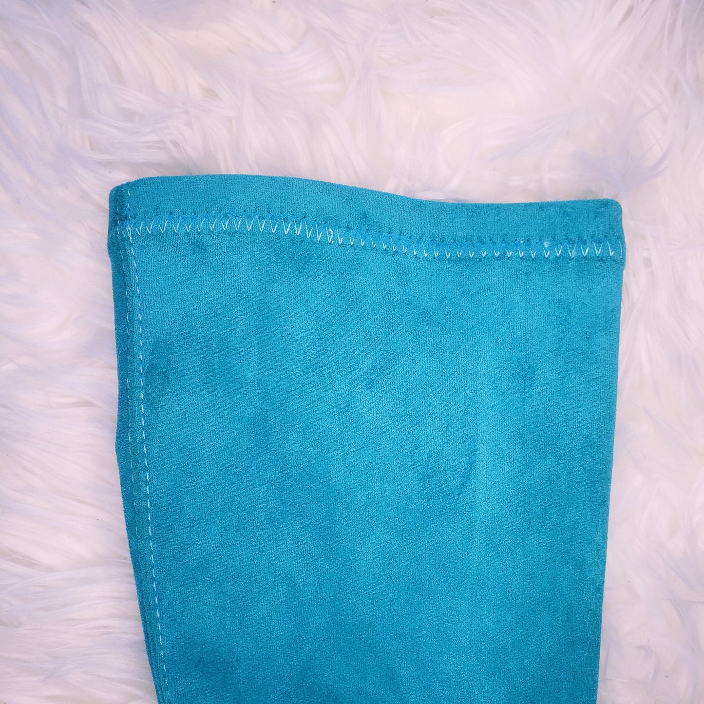 Teal blue suede retro chunky platform boots. Round toe and block heel give it a 60's and 70's inspired twist. Knee high suede boots.