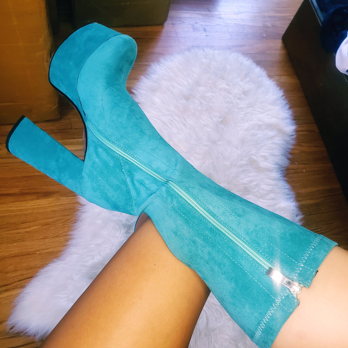Teal blue suede retro chunky platform boots. Round toe and block heel give it a 60's and 70's inspired twist. Knee high suede boots.
