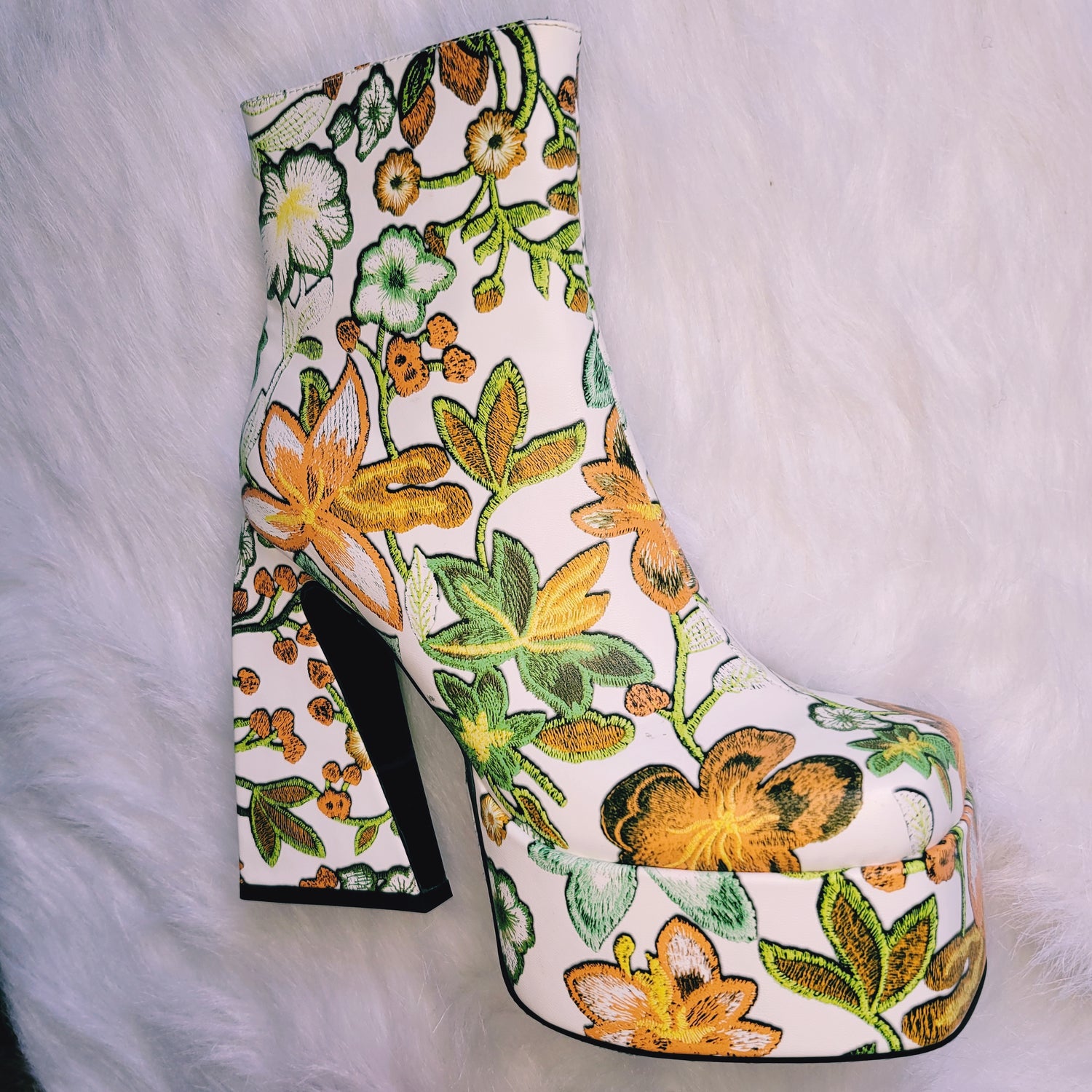 Retro 70's Platform ankle boots with orange and green floral print.