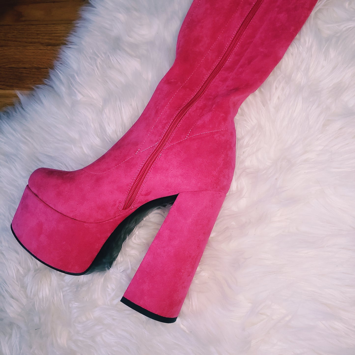 Pink suede retro chunky platform boots. Round toe and block heel give it a 60's and 70's inspired twist. Knee high suede boots. 